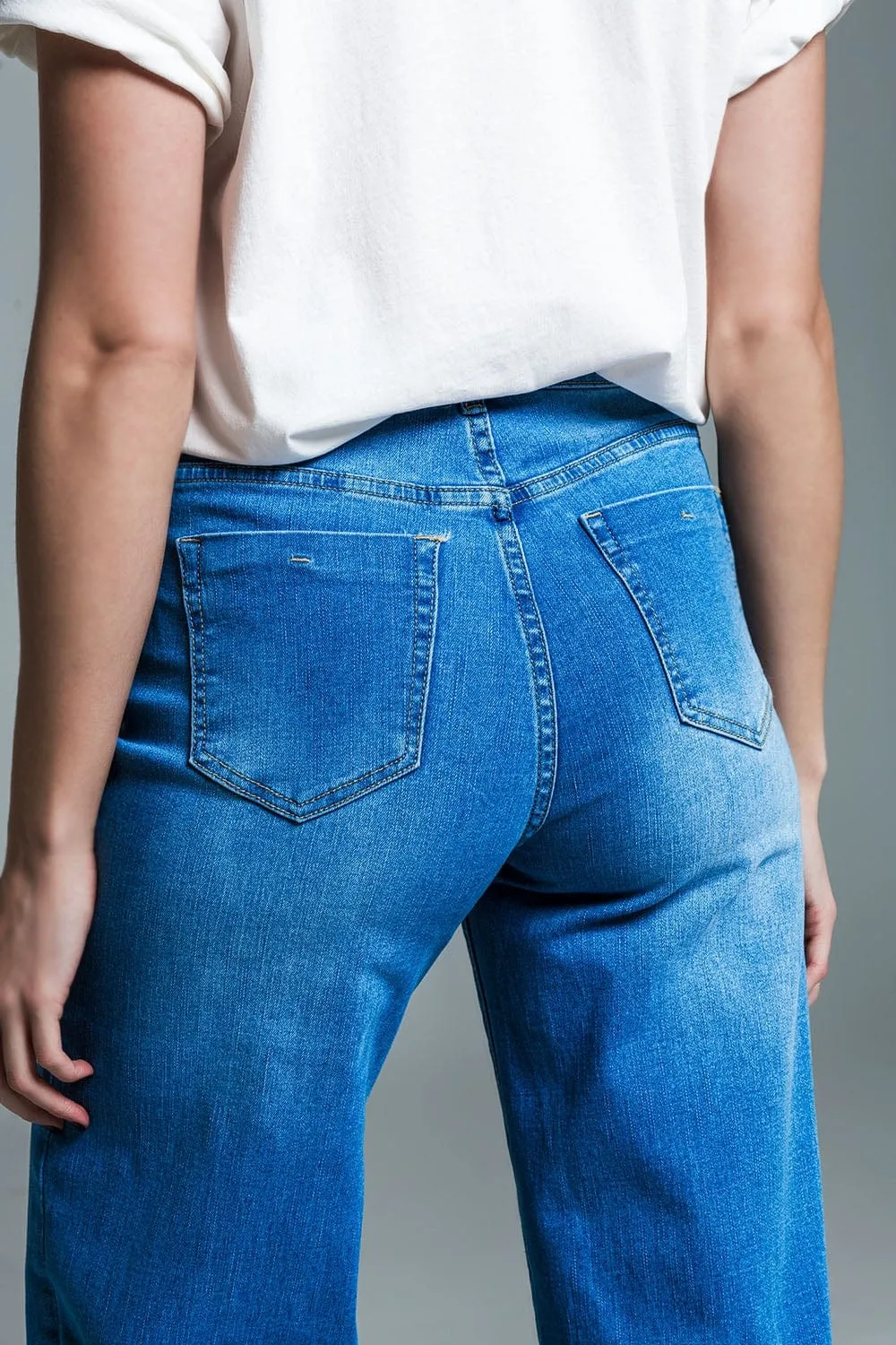 Palazzo Style Jeans In Mid Wash With Double Stitching Detail At The Hem