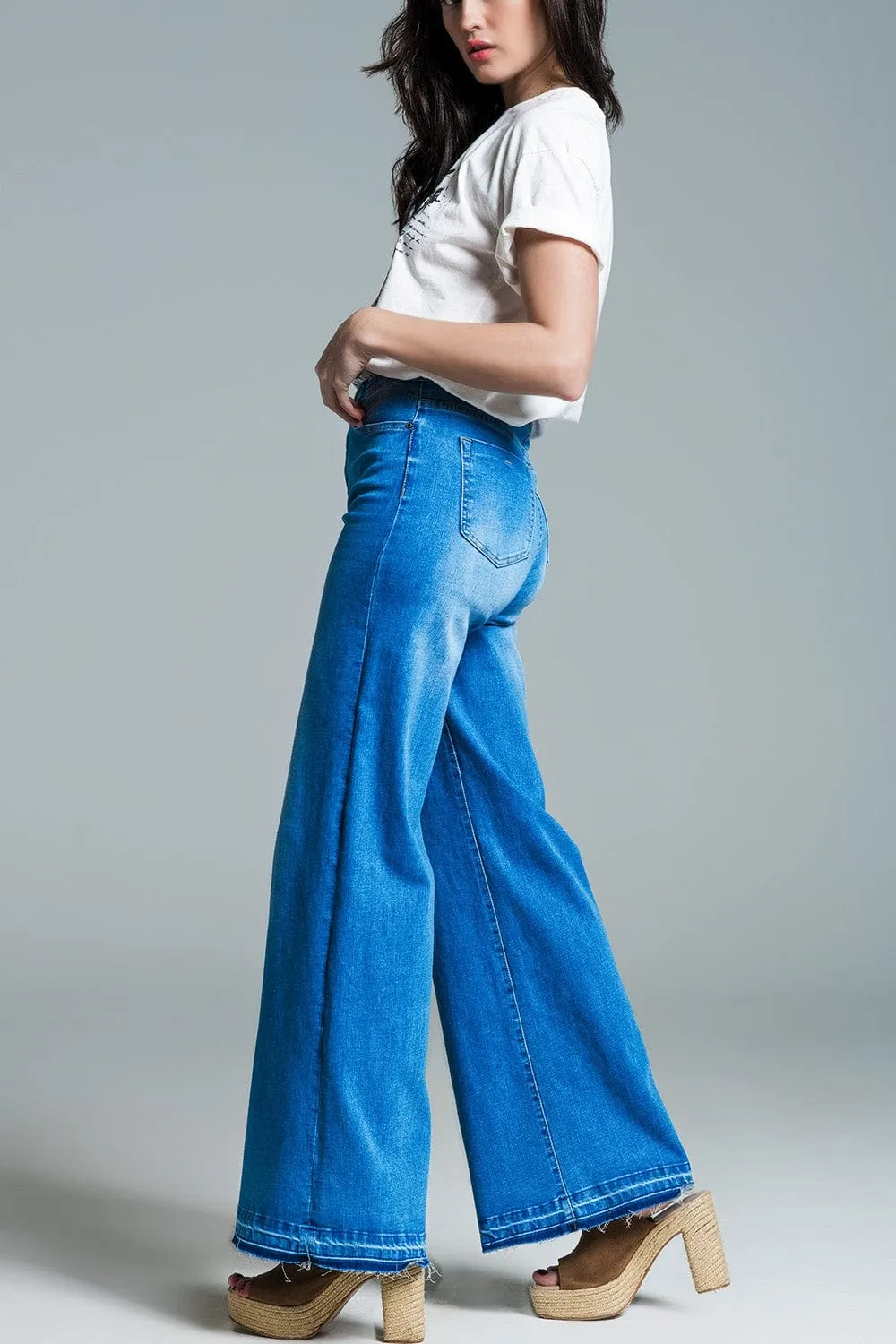 Palazzo Style Jeans In Mid Wash With Double Stitching Detail At The Hem