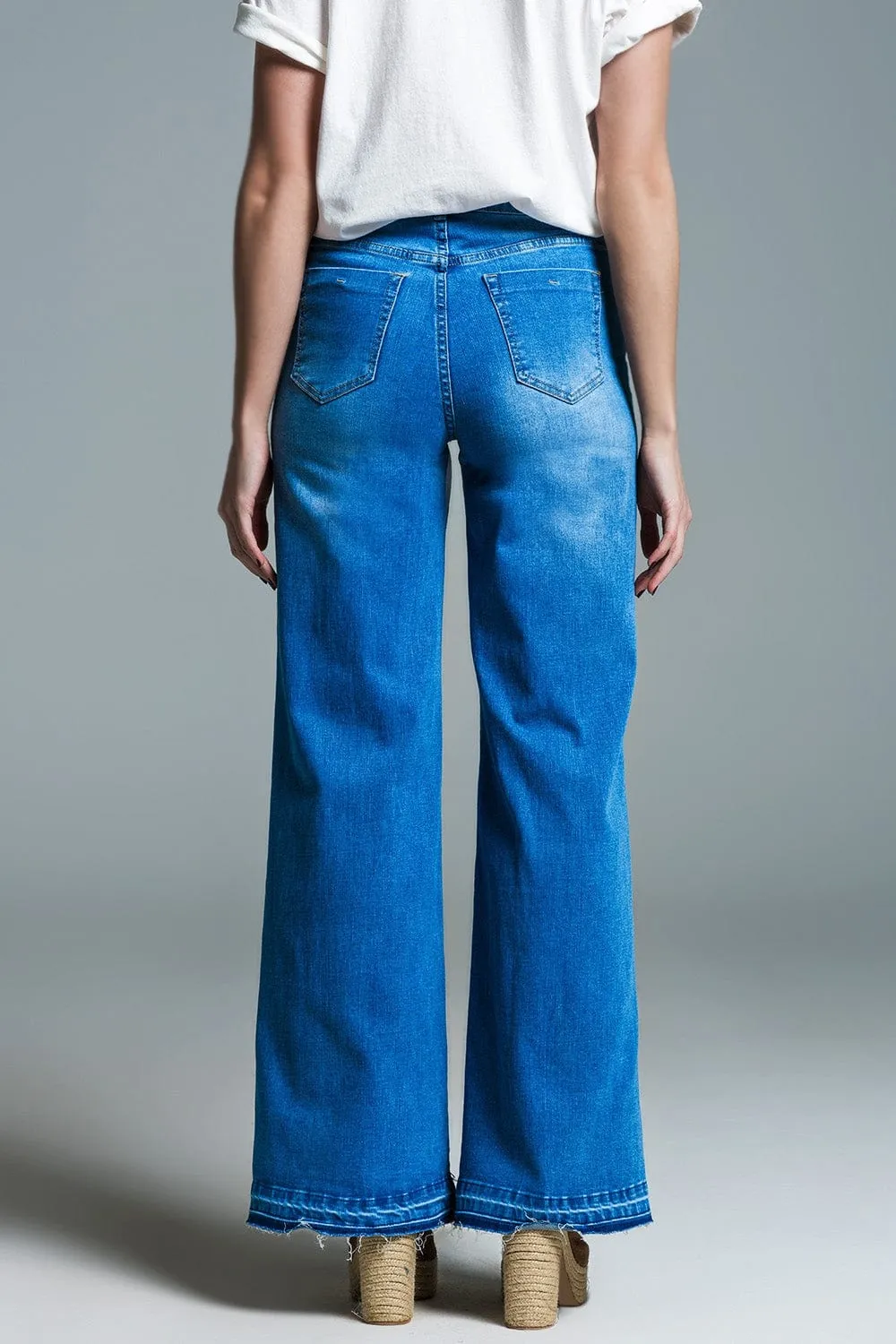 Palazzo Style Jeans In Mid Wash With Double Stitching Detail At The Hem